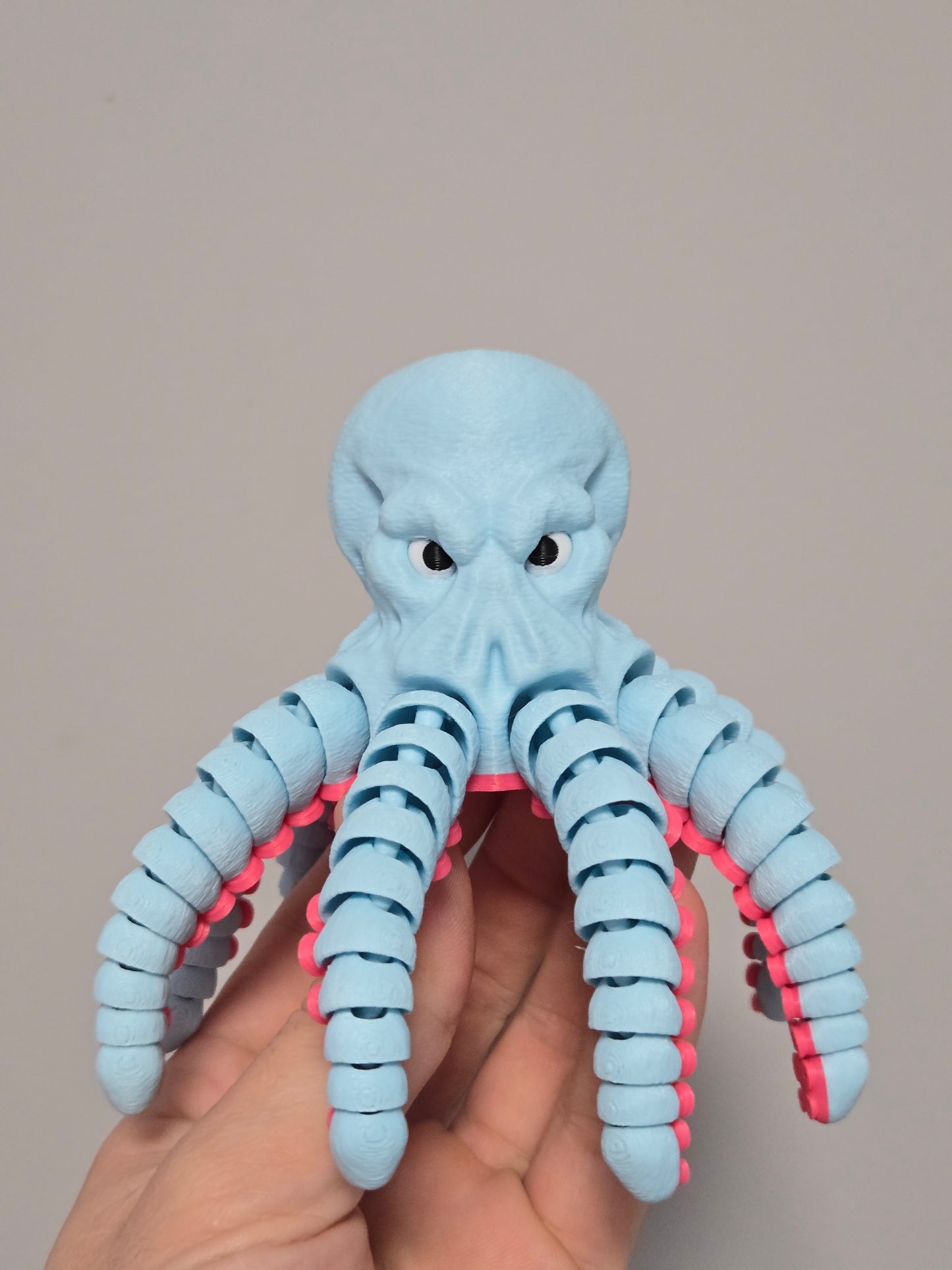 Dusmīgais astoņkājis - gaiši zils