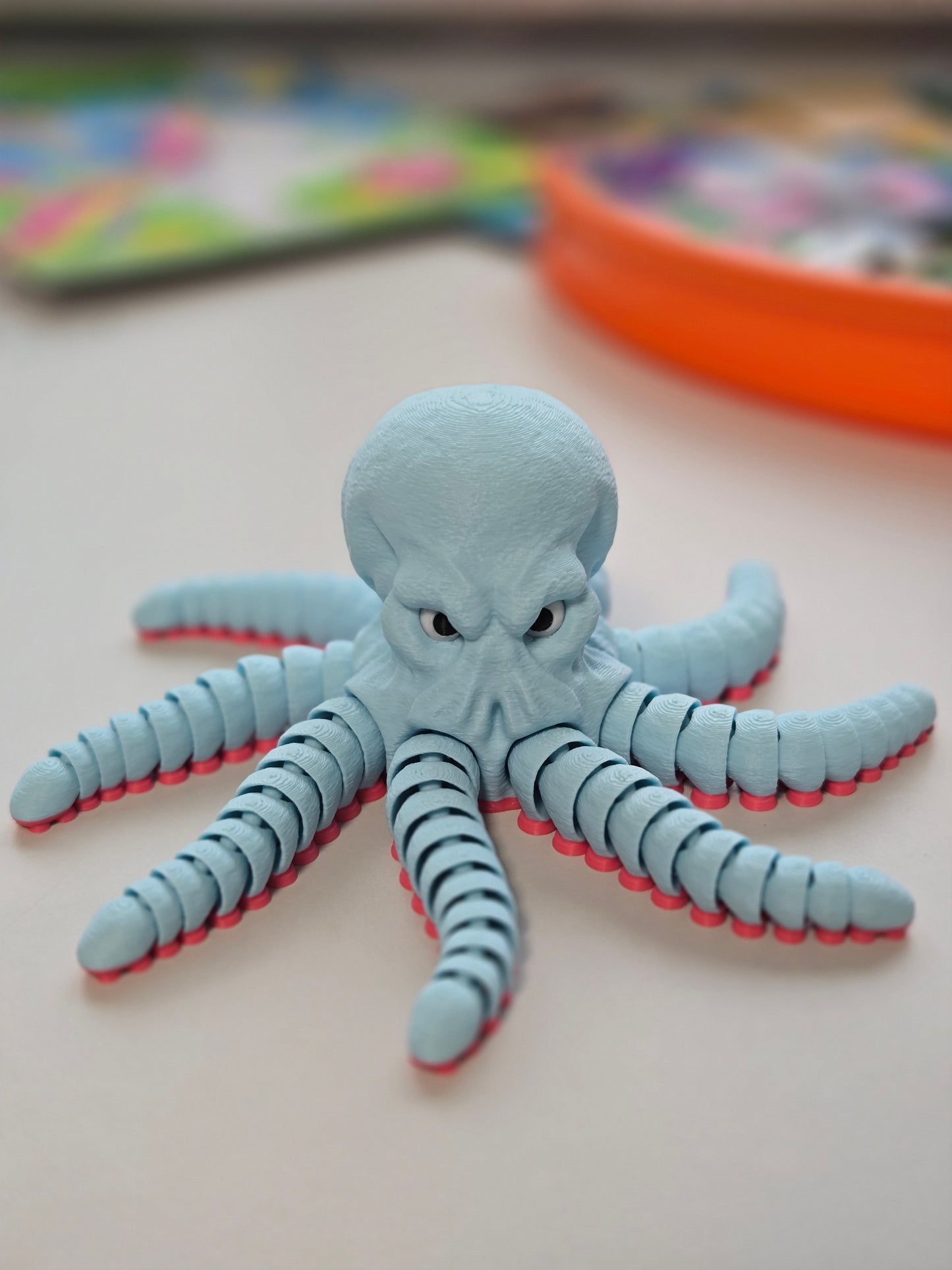 Dusmīgais astoņkājis - gaiši zils