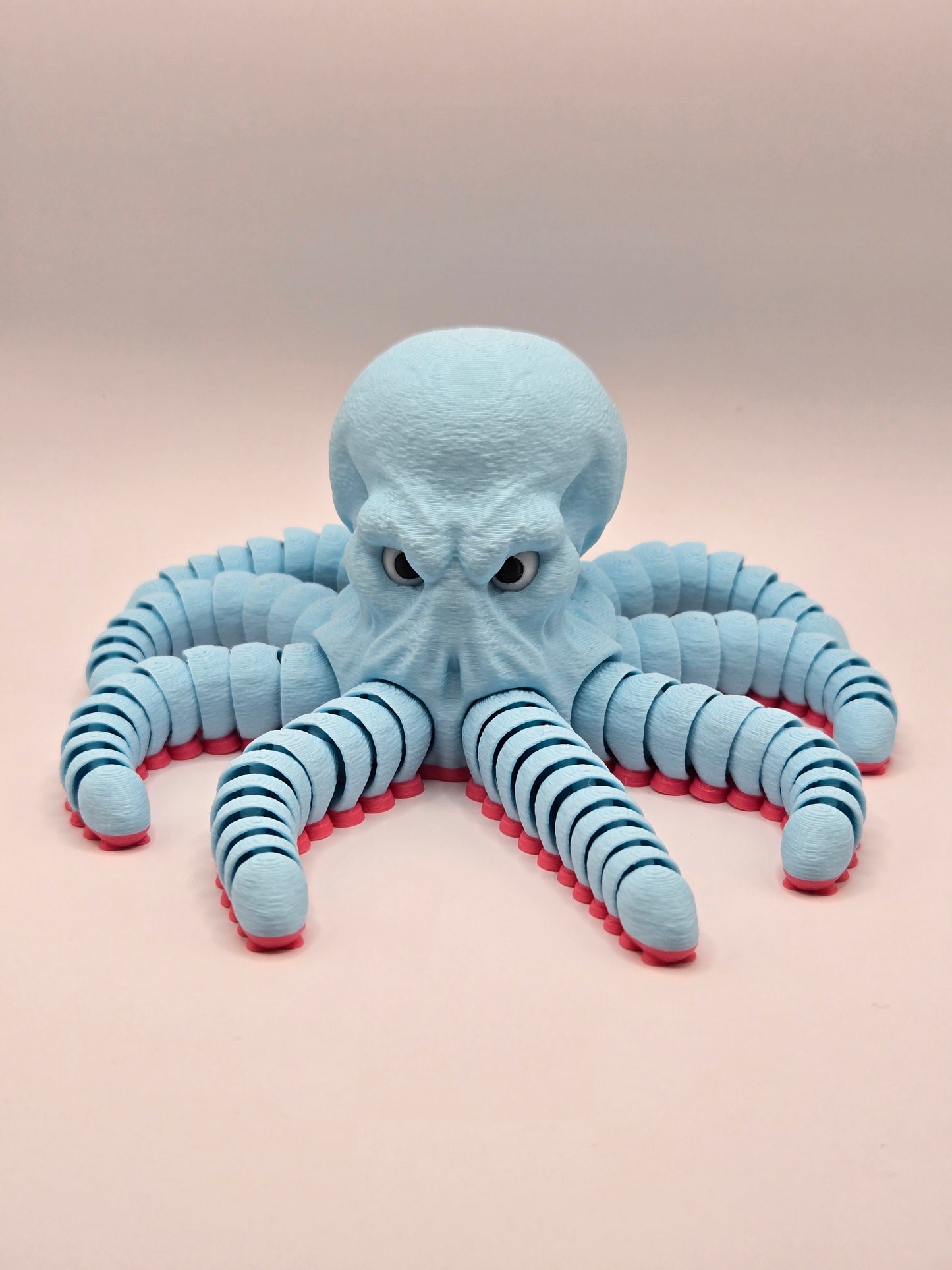 Dusmīgais astoņkājis - gaiši zils