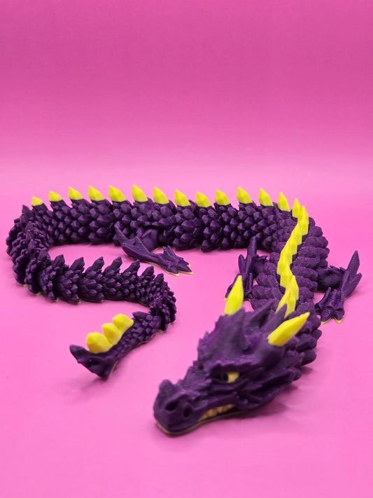 Kustīgs pūķis - tumši violets/dzeltens