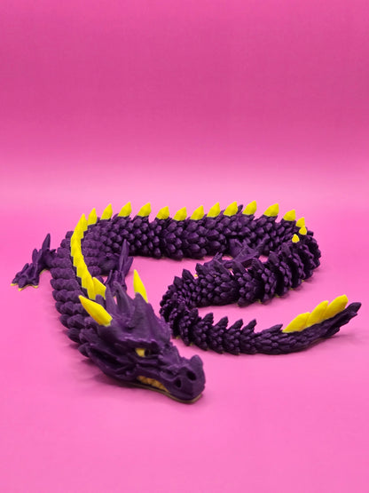 Kustīgs pūķis - tumši violets/dzeltens