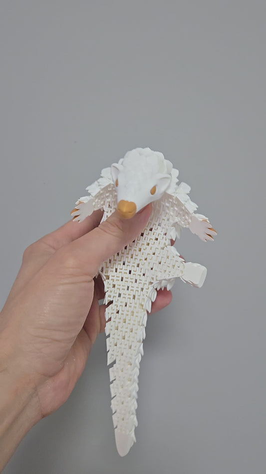 Pangolīns - baltā krāsā